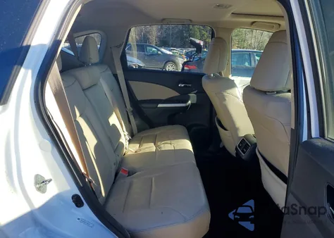 2015 Honda Cr-V Touring z USA, uszkodzony, nr VIN 5J6RM4H97FL033729